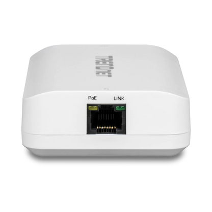 Golden retriever puppy playing with a ball